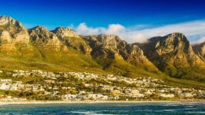 Camps Bay and The Twelve Apostles mountain range in Cape Town, South Africa.
