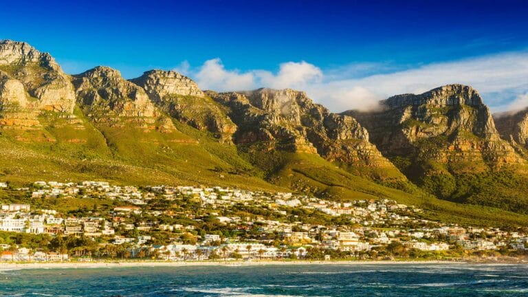 Camps Bay and The Twelve Apostles mountain range in Cape Town, South Africa.