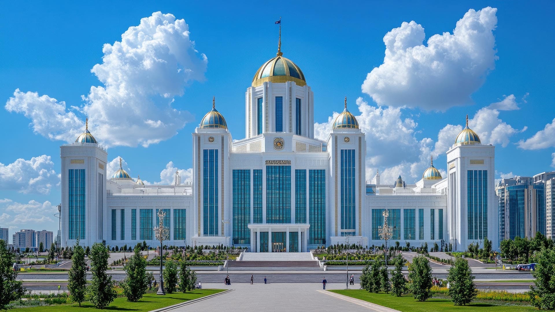 A majestic white building with golden domes and towering glass windows, set against a backdrop of vibrant blue skies and fluffy clouds.